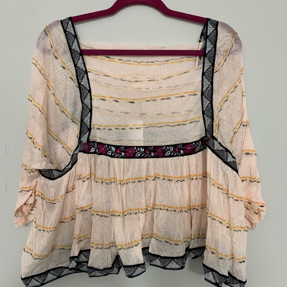 Urban Outfitters blouse with embroidery detail on front and back. Still has tags